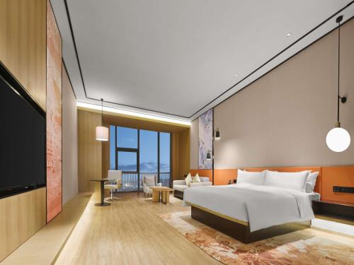 Imagen de la habitación del Hotel Hilton Garden Inn Jinzhong Yuci. Foto 19