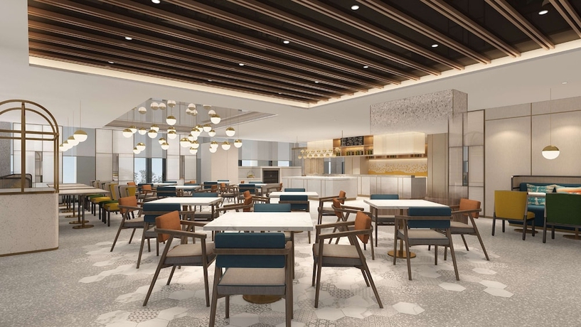 Imagen del bar/restaurante del Hotel Hilton Garden Inn Jinzhou Central Street. Foto 3