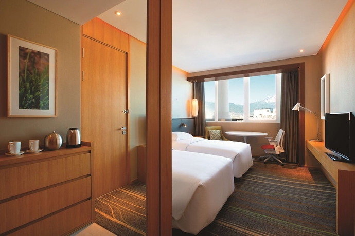 Imagen de la habitación del Hotel Hilton Garden Inn Lijiang. Foto 7