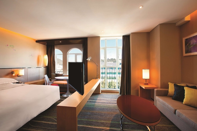 Imagen de la habitación del Hotel Hilton Garden Inn Lijiang. Foto 12