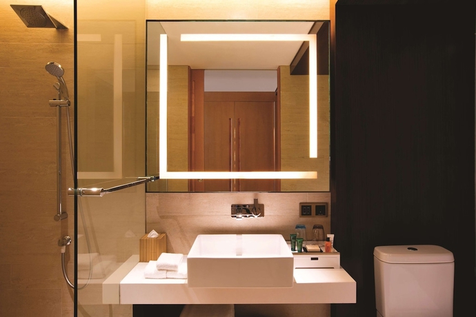 Imagen de la habitación del Hotel Hilton Garden Inn Lijiang. Foto 16