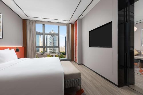 Imagen de la habitación del Hotel Hilton Garden Inn Luoyang Kaiyuan Avenue. Foto 5