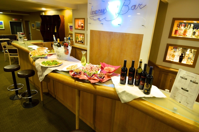 Imagen del bar/restaurante del Hotel Hilton Garden Inn Milan Malpensa. Foto 6