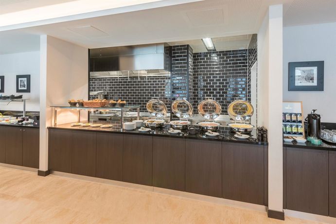 Imagen del bar/restaurante del Hotel Hilton Garden Inn Munich City Centre West. Foto 5