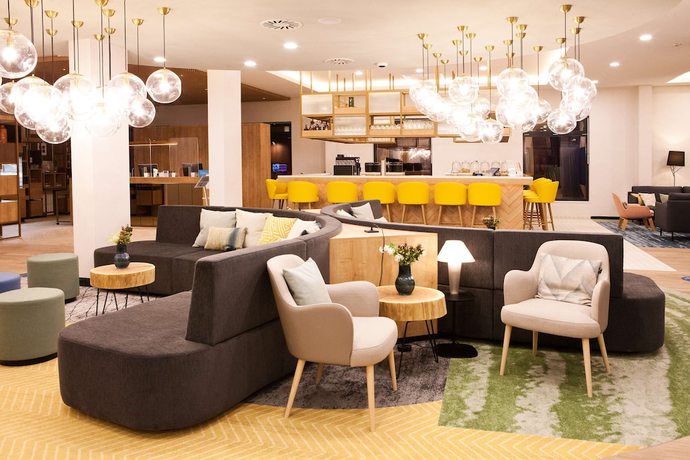 Imagen de los interiores del Hotel Hilton Garden Inn Munich Messe. Foto 14