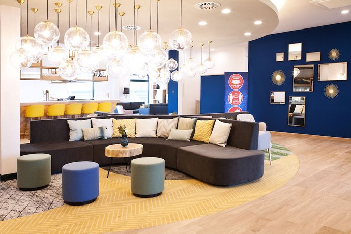 Imagen de los interiores del Hotel Hilton Garden Inn Munich Messe. Foto 18