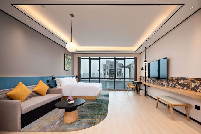 Imagen de la habitación del Hotel Hilton Garden Inn Nanchang Honggutan. Foto 11