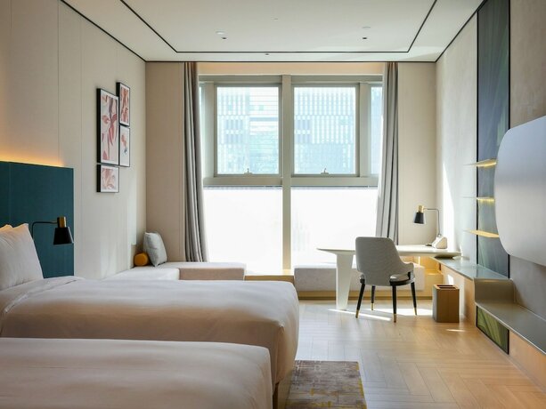 Imagen de la habitación del Hotel Hilton Garden Inn Nanjing Hexi Olympic Sports Center. Foto 11