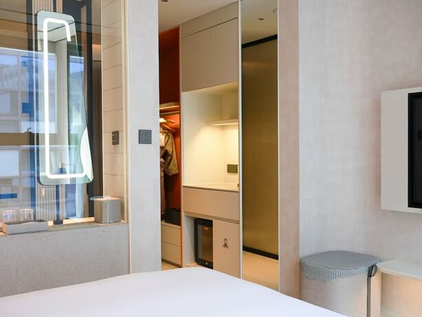 Imagen de la habitación del Hotel Hilton Garden Inn Nanjing Hexi Olympic Sports Center. Foto 21