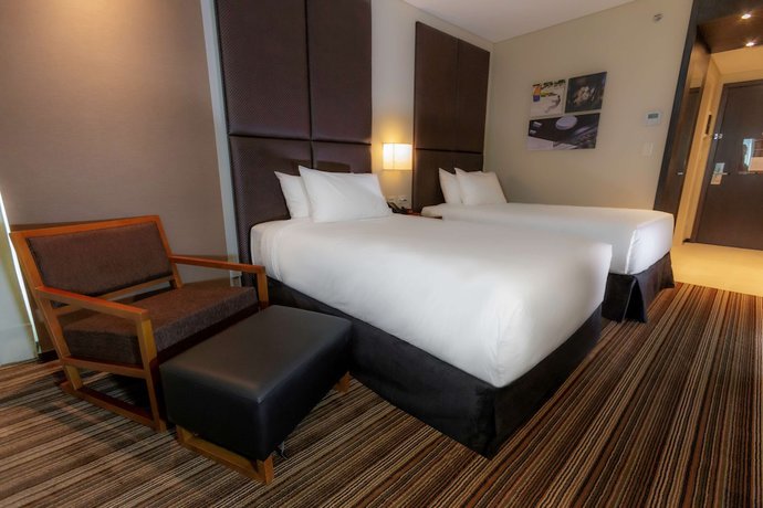 Imagen de la habitación del Hotel Hilton Garden Inn Neuquen. Foto 11