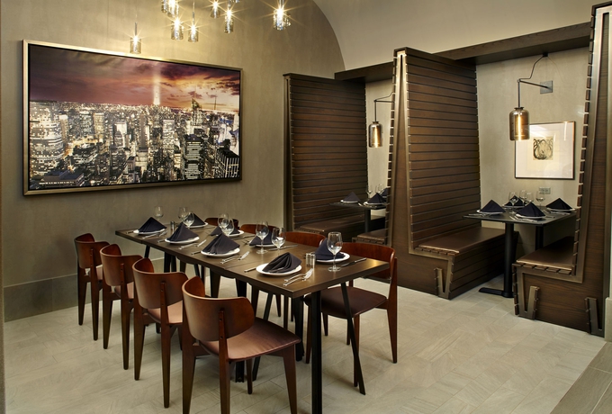 Imagen del bar/restaurante del Hotel Hilton Garden Inn New York Times Square North. Foto 2