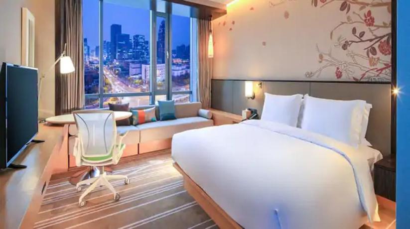 Imagen de la habitación del Hotel Hilton Garden Inn Ningbo. Foto 10