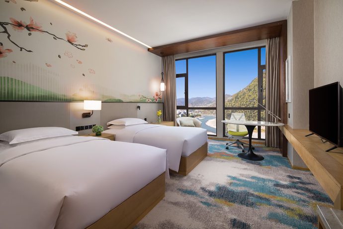 Imagen de la habitación del Hotel Hilton Garden Inn Nujiang. Foto 12