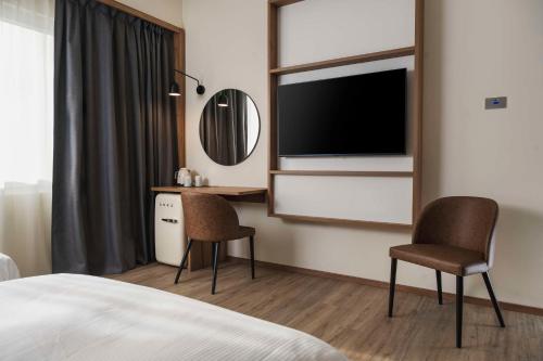 Imagen de la habitación del Hotel Hilton Garden Inn Padova City Centre. Foto 20