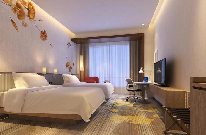 Imagen de la habitación del Hotel Hilton Garden Inn Qidong. Foto 5