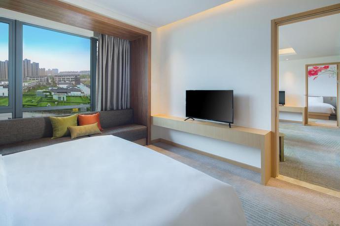 Imagen de la habitación del Hotel Hilton Garden Inn Qidong. Foto 8