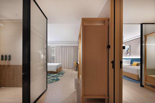 Imagen de la habitación del Hotel Hilton Garden Inn Rizhao High-Tech Zone. Foto 13