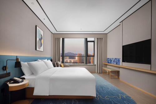Imagen de la habitación del Hotel Hilton Garden Inn Rizhao High-Tech Zone. Foto 17