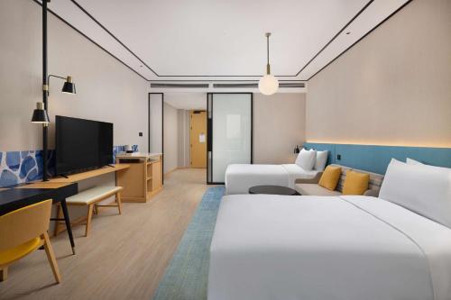 Imagen de la habitación del Hotel Hilton Garden Inn Rizhao High-Tech Zone. Foto 18