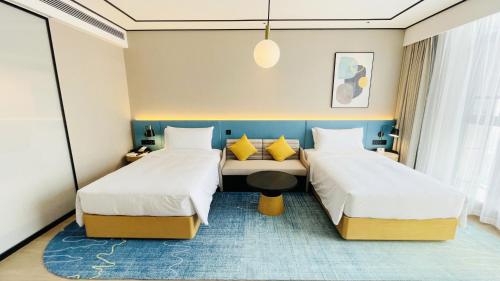 Imagen de la habitación del Hotel Hilton Garden Inn Rizhao High-Tech Zone. Foto 20