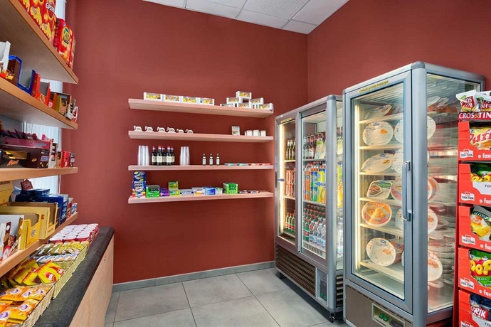 Imagen del bar/restaurante del Hotel Hilton Garden Inn Rome Airport. Foto 6