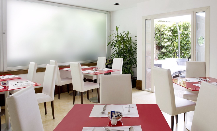 Imagen del bar/restaurante del Hotel Hilton Garden Inn Rome Claridge. Foto 4