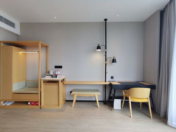 Imagen de la habitación del Hotel Hilton Garden Inn Shanghai Lujiazui. Foto 22