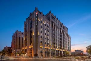 Imagen de los exteriores del Hotel Hilton Garden Inn Shanghai Wujiaochang. Foto 15