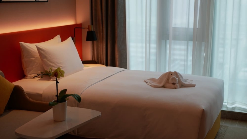 Imagen de la habitación del Hotel Hilton Garden Inn Shenzhen Airport. Foto 3