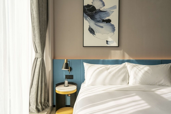 Imagen de la habitación del Hotel Hilton Garden Inn Shenzhen Airport. Foto 5