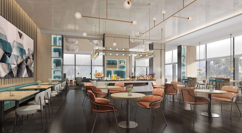 Imagen del bar/restaurante del Hotel Hilton Garden Inn Shenzhen World Exhibition and Convention Center. Foto 6