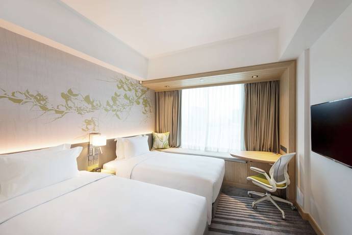 Imagen de la habitación del Hotel Hilton Garden Inn Singapore Serangoon. Foto 13