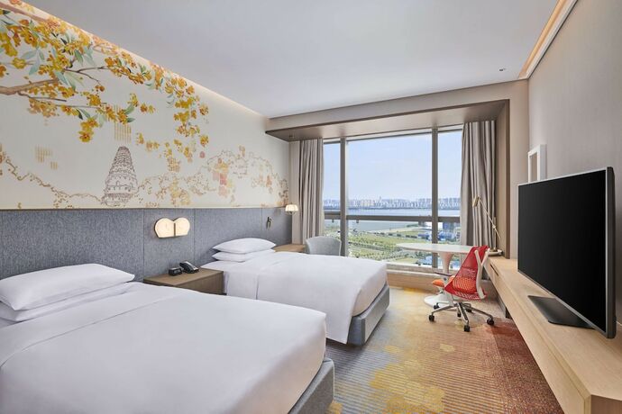 Imagen de la habitación del Hotel Hilton Garden Inn Suzhou Wuzhong. Foto 15