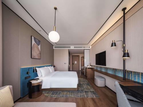 Imagen de la habitación del Hotel Hilton Garden Inn Taiyuan Binhe. Foto 11