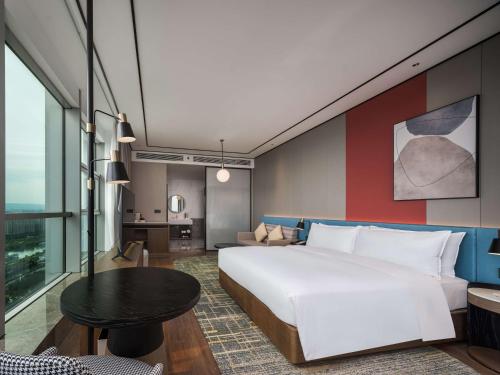 Imagen de la habitación del Hotel Hilton Garden Inn Taiyuan Binhe. Foto 12