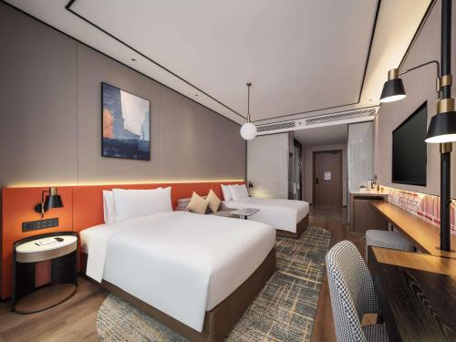 Imagen de la habitación del Hotel Hilton Garden Inn Taiyuan Binhe. Foto 14