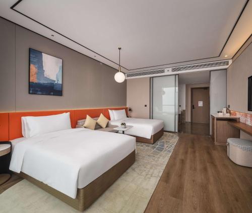 Imagen de la habitación del Hotel Hilton Garden Inn Taiyuan Binhe. Foto 15