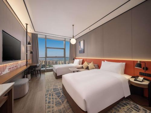 Imagen de la habitación del Hotel Hilton Garden Inn Taiyuan Binhe. Foto 19