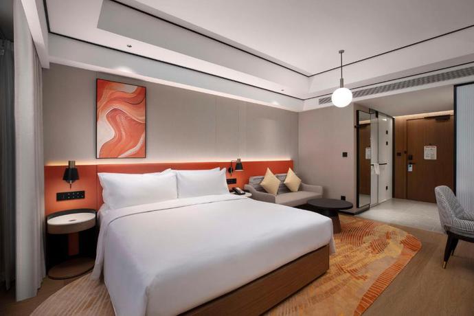 Imagen de la habitación del Hotel Hilton Garden Inn Tianjin Five Great Avenues. Foto 9
