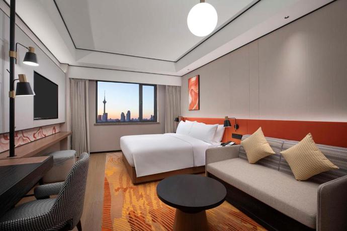 Imagen de la habitación del Hotel Hilton Garden Inn Tianjin Five Great Avenues. Foto 12