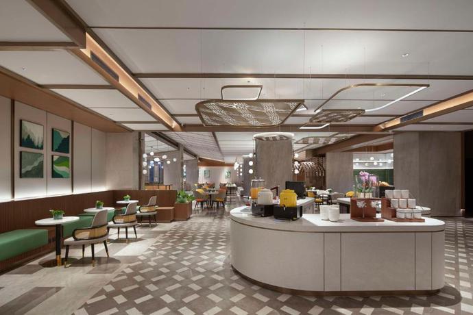 Imagen del bar/restaurante del Hotel Hilton Garden Inn Tianjin Five Great Avenues. Foto 3