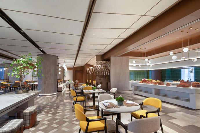 Imagen del bar/restaurante del Hotel Hilton Garden Inn Tianjin Five Great Avenues. Foto 5