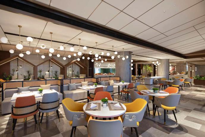 Imagen del bar/restaurante del Hotel Hilton Garden Inn Tianjin Five Great Avenues. Foto 6