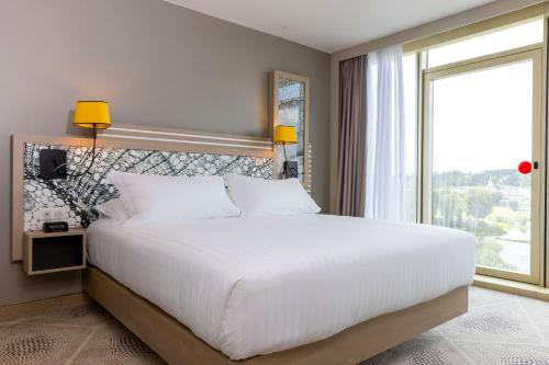 Imagen de la habitación del Hotel Hilton Garden Inn Tours Centre. Foto 15