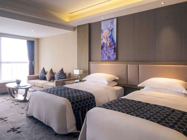 Imagen de la habitación del Hotel Hilton Garden Inn Wuhan Hankou. Foto 2