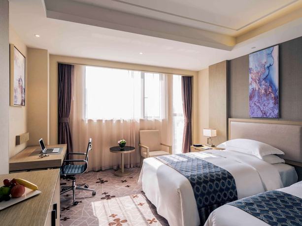 Imagen de la habitación del Hotel Hilton Garden Inn Wuhan Hankou. Foto 12