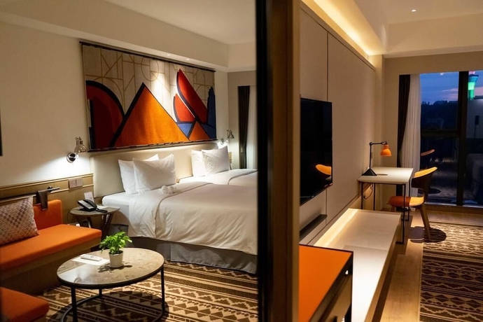 Imagen de la habitación del Hotel Hilton Garden Inn Xiamen Bailuzhou Park. Foto 10