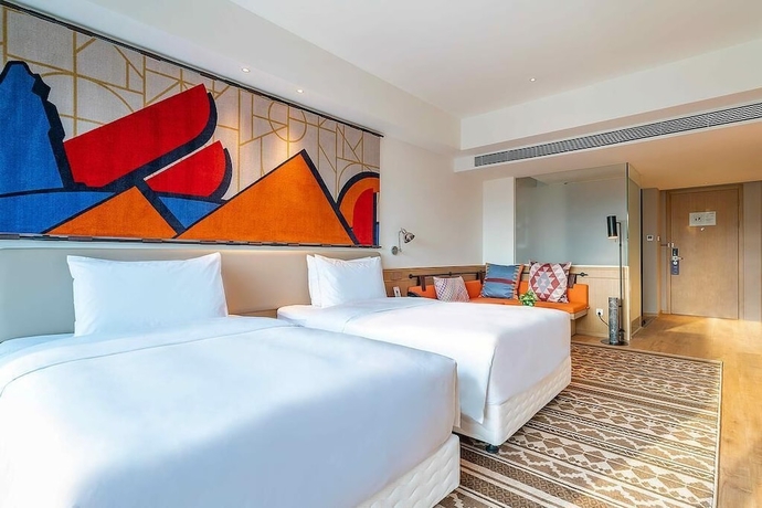 Imagen de la habitación del Hotel Hilton Garden Inn Xiamen Bailuzhou Park. Foto 11