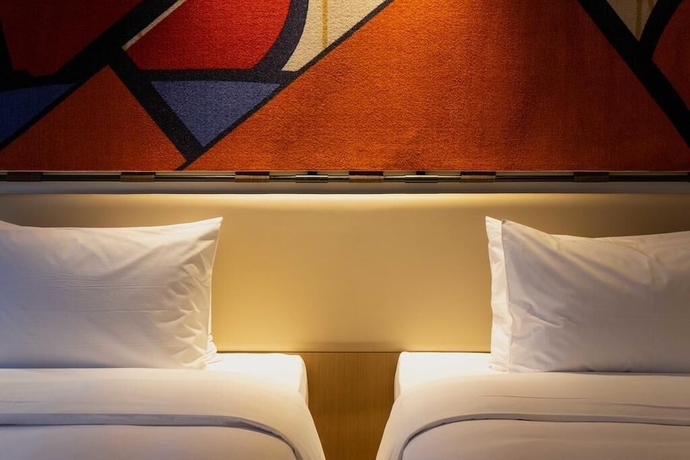 Imagen de la habitación del Hotel Hilton Garden Inn Xiamen Bailuzhou Park. Foto 12