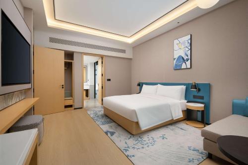 Imagen de la habitación del Hotel Hilton Garden Inn Xuzhou Pengcheng Square. Foto 16